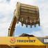 Nakládání kloubového dempru Volvo A30D pásovým rypadlem Caterpillar 330D LN