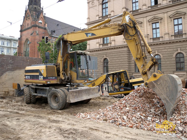 Kolové rypadlo Caterpillar M 315 firmy Aleš Malášek zemní práce