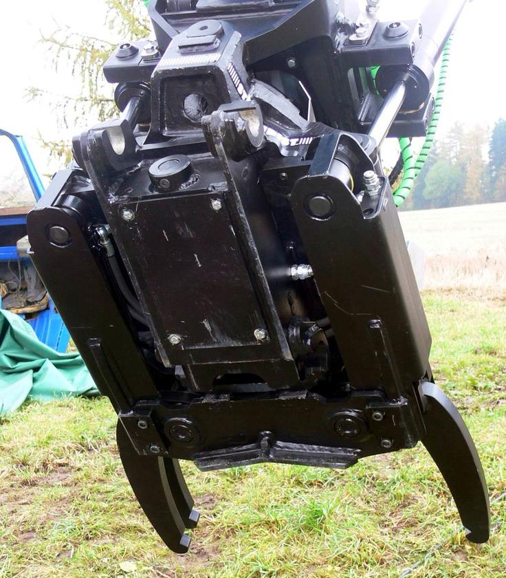 Rychloupínač severského S-standardu integrovaný v naklápěcím rotátoru firmy Steelwrist AB