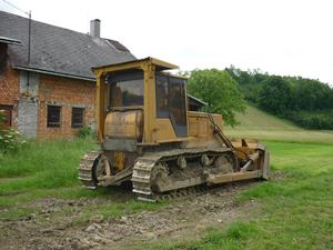 Re: Buldozery,Grejdry Valce a Pásove nakladače