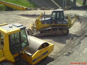 Re: Buldozery,Grejdry Valce a Pásove nakladače