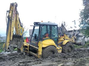 Re: New Holland LB115.B