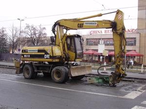 CAT M318