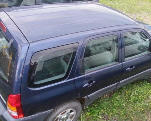 _JINÉ Mazda - Tribute Van 2.0
