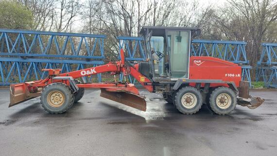GREJDR O&K F 106.5 A 6x6+NIVELACE TOPCON