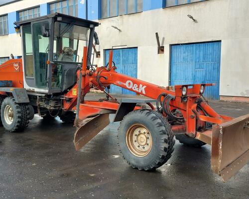 GREJDR O&K F 106.5 A 6x6+NIVELACE TOPCON