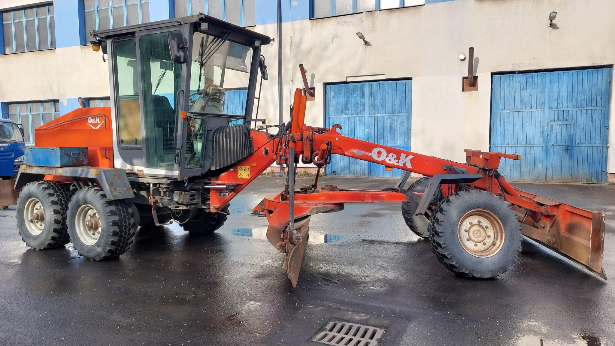 GREJDR O&K F 106.5 A 6x6+NIVELACE TOPCON