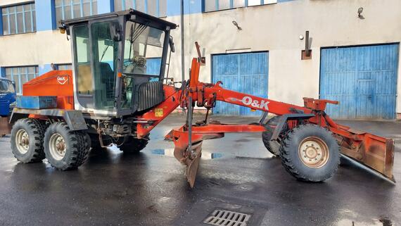 GREJDR O&K F 106.5 A 6x6+NIVELACE TOPCON