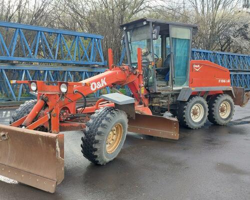 GREJDR O&K F 106.5 A 6x6+NIVELACE TOPCON