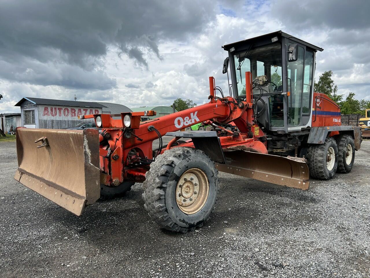 GREJDR O&K F 106.5 A 6x6+NIVELACE TOPCON