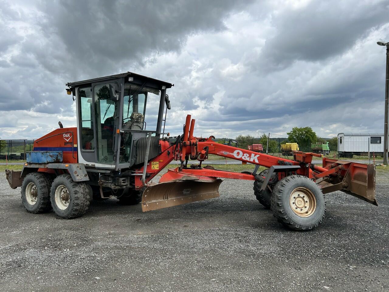 GREJDR O&K F 106.5 A 6x6+NIVELACE TOPCON