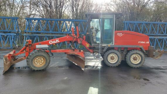 GREJDR O&K F 106.5 A 6x6+NIVELACE TOPCON