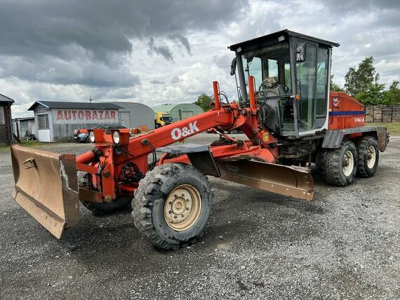 GREJDR O&K F 106.5 A 6x6+NIVELACE TOPCON