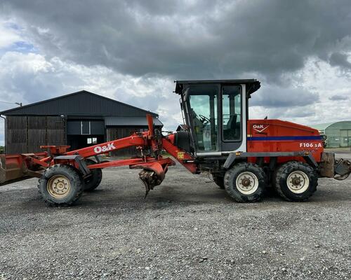 GREJDR O&K F 106.5 A 6x6+NIVELACE TOPCON
