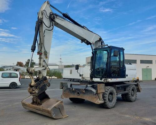CATERPILLAR  M 313 D-STROJ V SUPER STAVU