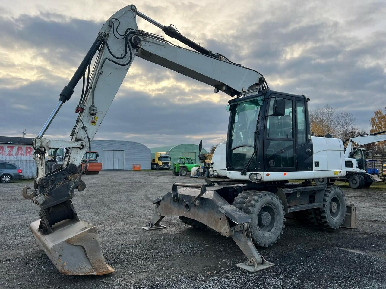 CATERPILLAR  M 313 D-STROJ V SUPER STAVU 