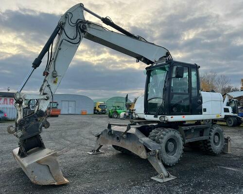 CATERPILLAR  M 313 D - STROJ V SUPER STAVU 
