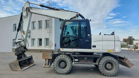 KOLOVÉ RÝPADLO CATERPILLAR M 313 D