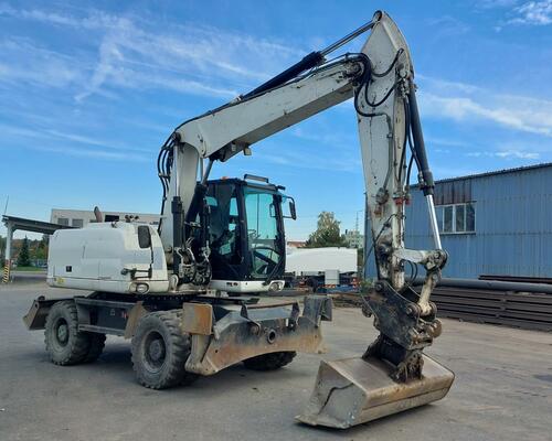 KOLOVÉ RÝPADLO CATERPILLAR M 313 D