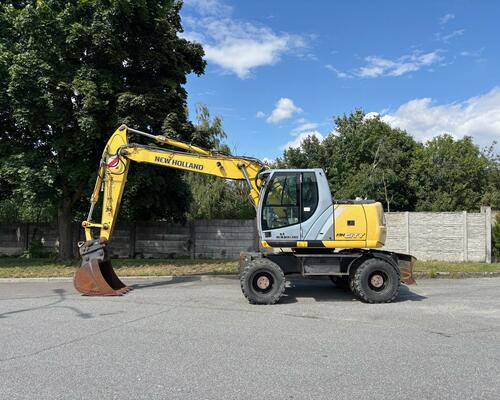 Kolové rypadlo / nakladač New Holland MH CITY 16T