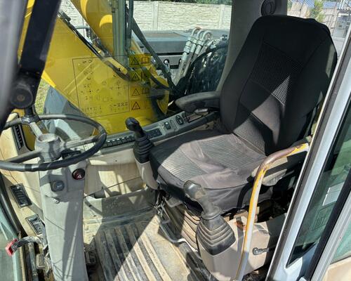 Kolové rypadlo / nakladač New Holland MH CITY 16T