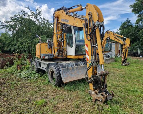 LIEBHERR 312 kolový bagr LIEBHERR A312
