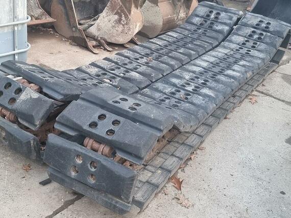 JCB Bridgestone ocelové řetězy pásu s gumovýma podložkama  GEOgrip (86C,100C)