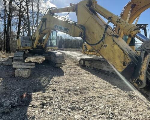 New Holland E 485 Kobelco