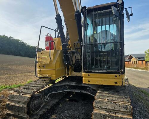 Pásový bagr CAT 325, r.v. 2021, 9543 mth, s drapákem DEHACO