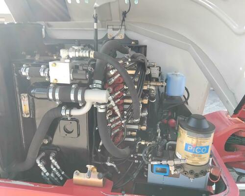 Takeuchi TB260 Powertilt, Centrální mazání