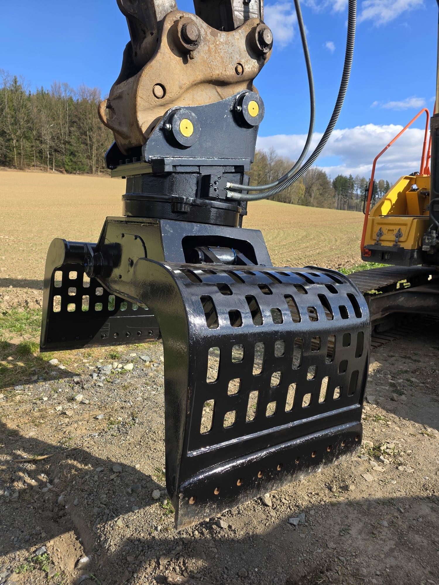 Demoliční - třídící drapák Caterpillar r.v. 2018