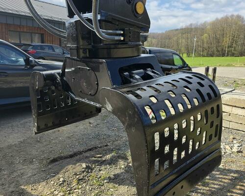 Demoliční - třídící drapák Caterpillar r.v. 2018