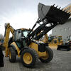 Caterpillar 434E na tiskové konferenci v Mostě