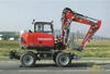 Neuson 9503 při přejezdu