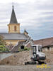 Kubota KX101-3α2 Silver na pozadí kostela sv. Urbana v Olomouci