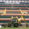Caterpillar 428E na stadionu ragbyového klubu Leicester Tigers