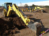 Caterpillar 432E na zkušebním polygonu v Leicesteru