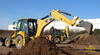 Caterpillar 432E na zkušebním polygonu v Leicesteru