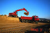Caterpillar M315 s plnou lžící