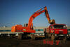 Fiat Kobelco EX215 nakládá Tatru T815