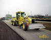 Grejdr Caterpillar 12H firmy F.Kirchhoff s přední radlicí Stabau a nivelací Trimble