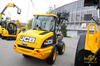 Kolový nakladač JCB 406 s vidlemi na kulatinu Kame-VM
