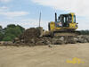 Dozer Komatsu 41P při urovnávání nové podkladní vrstvy