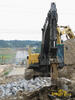 Pásové rypadlo Volvo EC360C L s bouracím kladivem