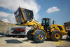 Kolový nakladač New Holland W270B s ochrannými řetězy Pewag Universal U 242 2 ED