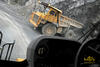 Pevný dempr Caterpillar 773B viděný z dempru 773F