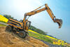 Kolové rypadlo Caterpillar M 318 slovenské firmy HRT