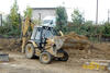 Rypadlonakladač Caterpillar 428B firmy Silnice Čáslav
