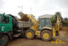 Rypadlonakladač Komatsu WB 97 S s mimoosým rýpáním firmy Silnice Čáslav
