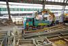 Pásové rypadlo Komatsu PC228USLC nakládá MAN TGA 33.440